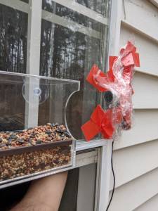 Picture of webcam attached to the side of my apartment building