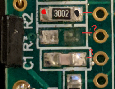 PM-128 with R3 solder pad missing; closeup with overlaid speculative schematic markings